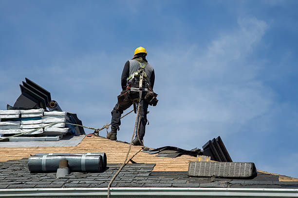 Professional Gutter Installation technician working in Olin, IA